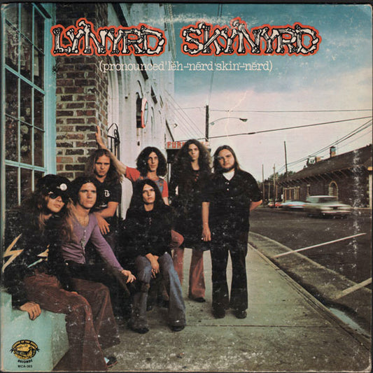 (Pronounced 'Lĕh-'nérd 'Skin-'nérd) by Lynyrd Skynyrd