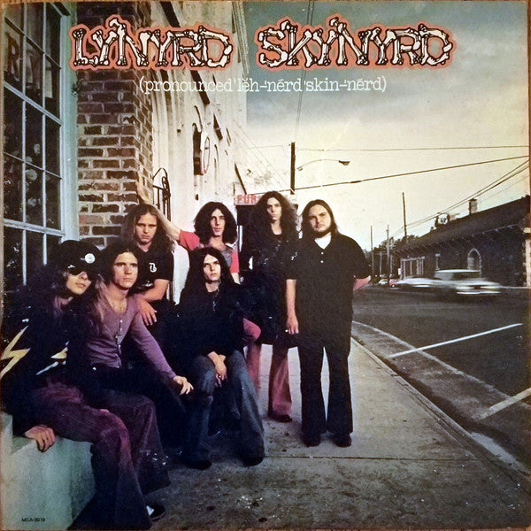 (Pronounced 'Lĕh-'nérd 'Skin-'nérd) by Lynyrd Skynyrd