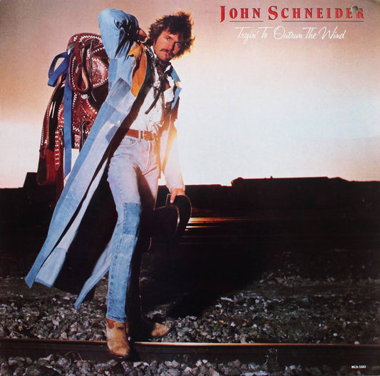 Tryin' To Outrun The Wind by John Schneider