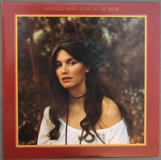 Roses In The Snow by Emmylou Harris