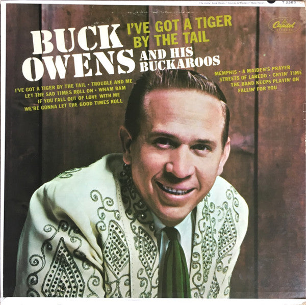 I've Got A Tiger By The Tail by Buck Owens And His Buckaroos